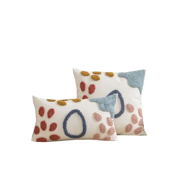 Taie d'oreiller à motif de pétales colorés