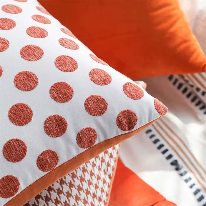 Juste de coussin à motif géométrique