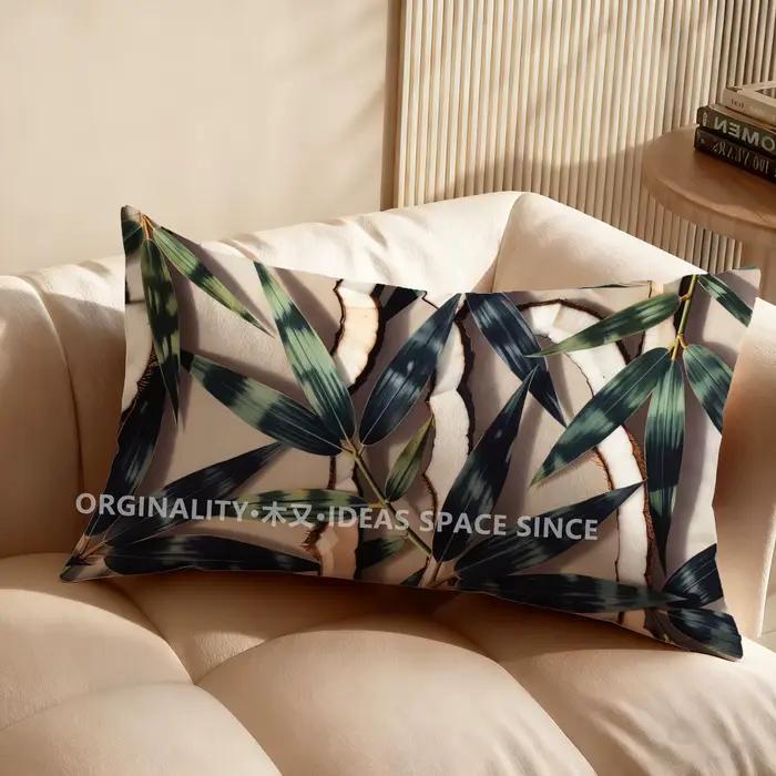 Coussin rectangulaire à motif de feuilles vertes