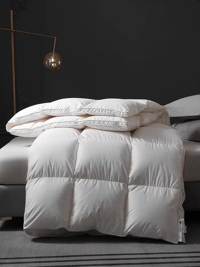 Courtepointes luxueuses en duvet d'oie véritable