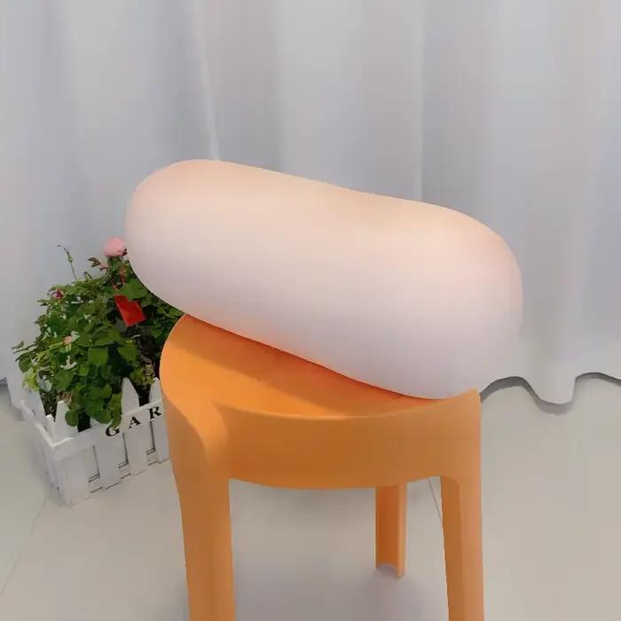 Oreiller cylindrique en rouleau de micro-perles de particules de mousse intégrées