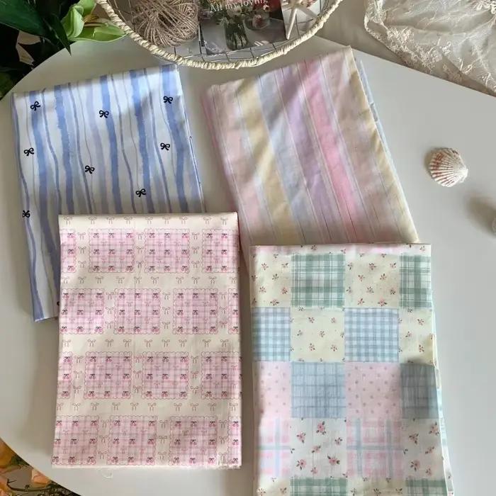 Tissu imprimé Floral bleu rose à rayures avec nœud papillon