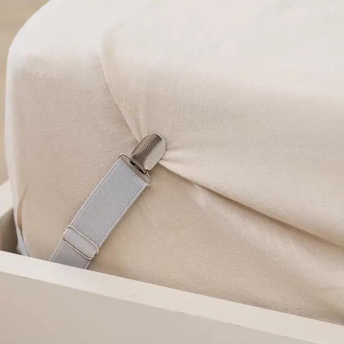 Attaches de drap de lit réglables
