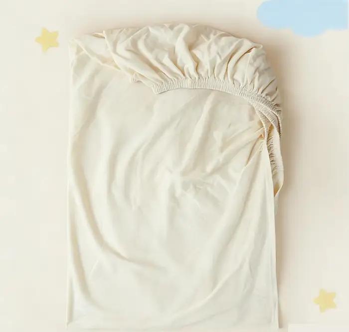 Drap-housse pour bébé 100% coton respirant, doux et confortable, couleur unie