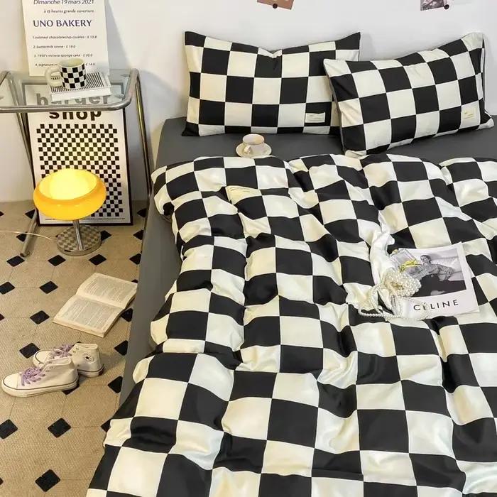 Parure de lit à carreaux noir et blanc