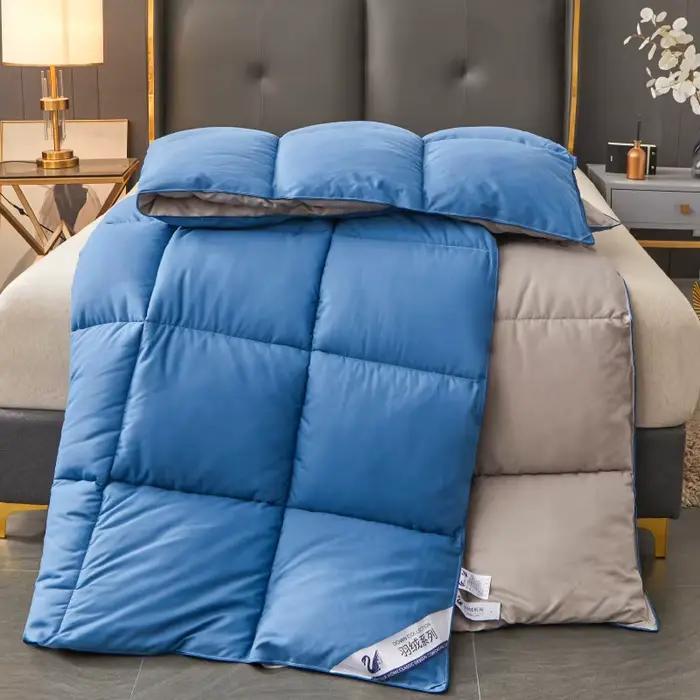 Couette en duvet d'oie blanche comme rembourrage