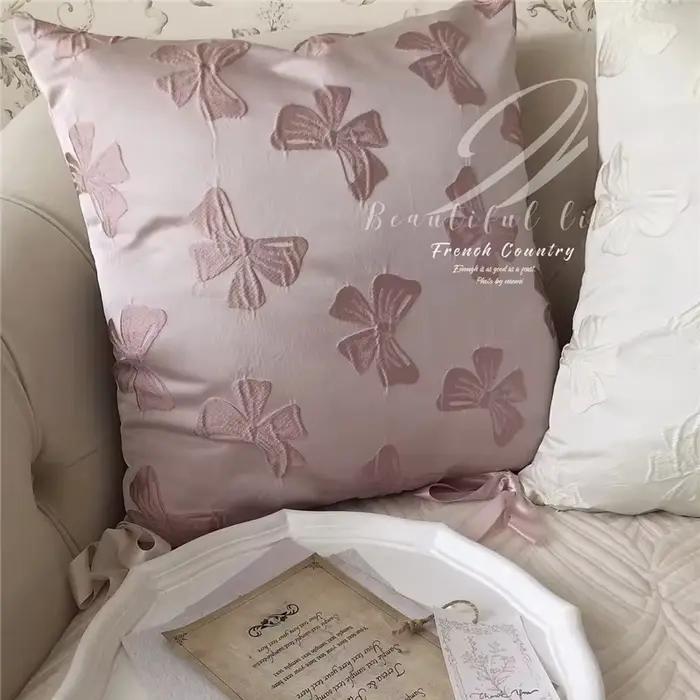 Taie d'oreiller Jacquard avec nœud rose