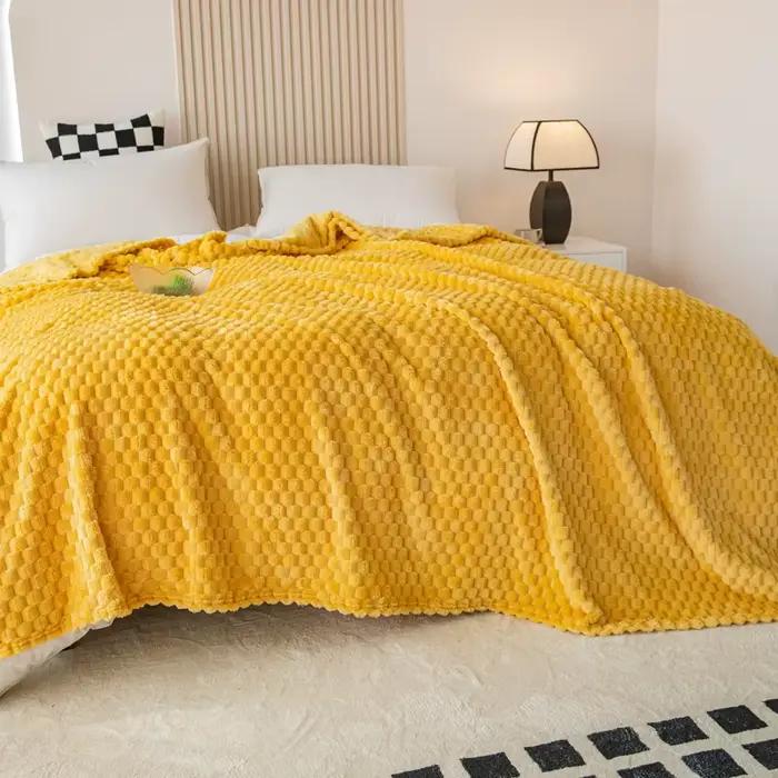 Couverture unie jaune à carreaux