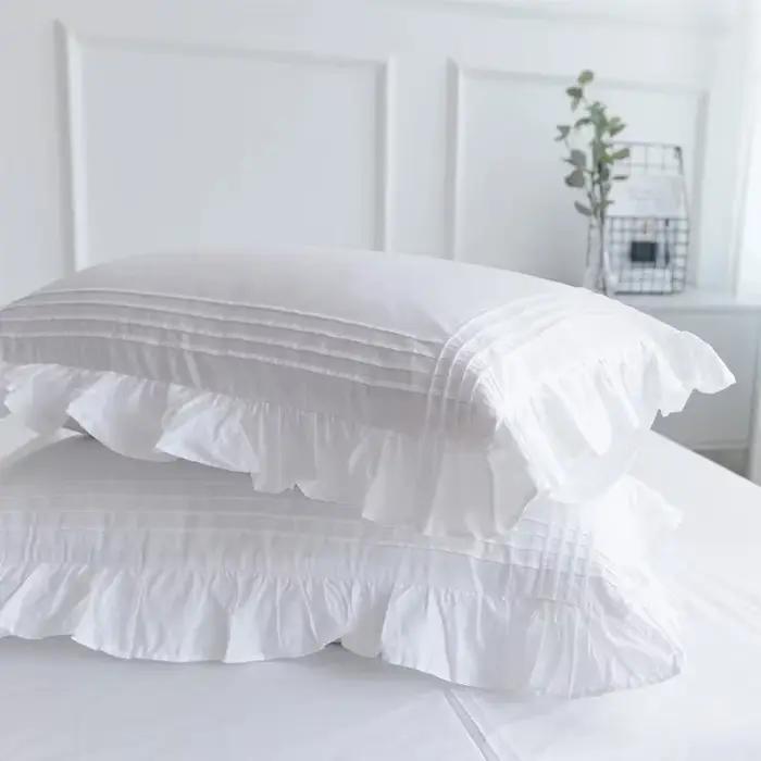 Lot de 2 taies d'oreiller blanches en coton 100% avec volants froncés