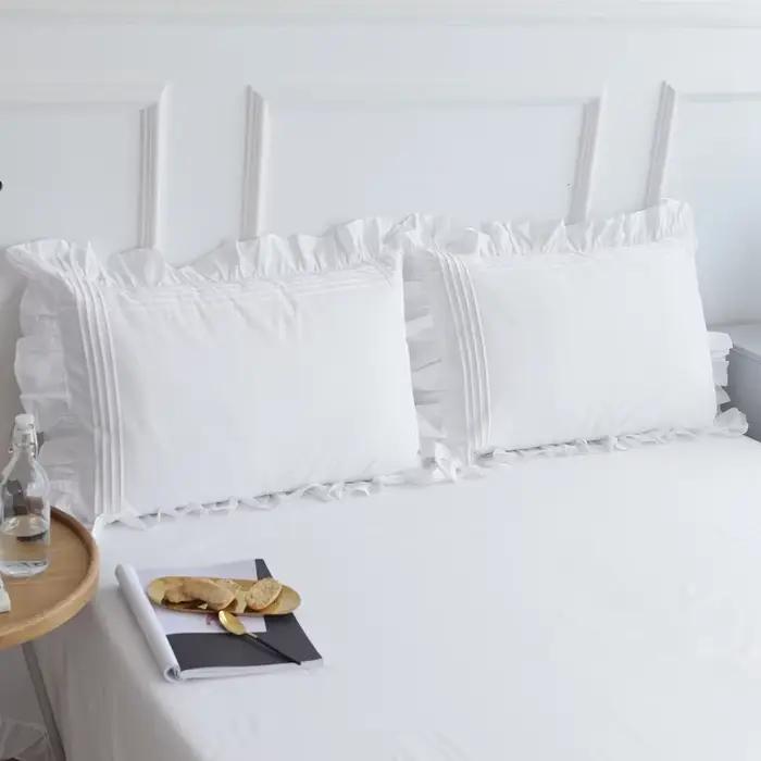 Lot de 2 taies d'oreiller blanches en coton 100% avec volants froncés